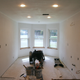 Kitchen drywall taped and floated, but not yet textured